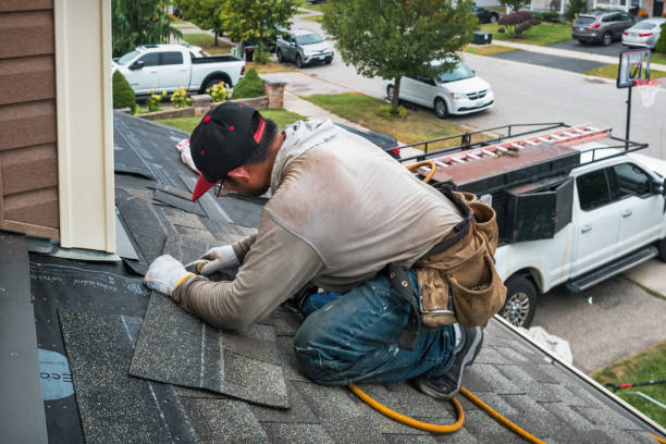 Professional Roof Replacement technician working in Woodbury Heights, NJ